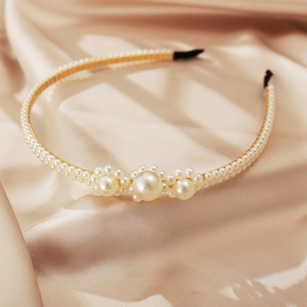 Diadema de perlas