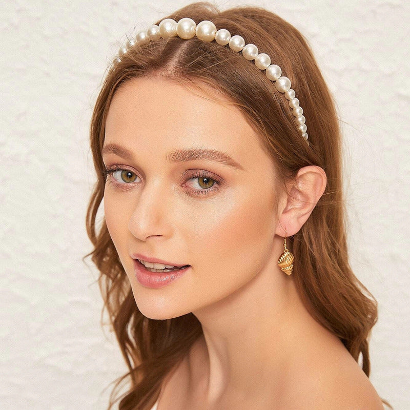 Diadema de perlas