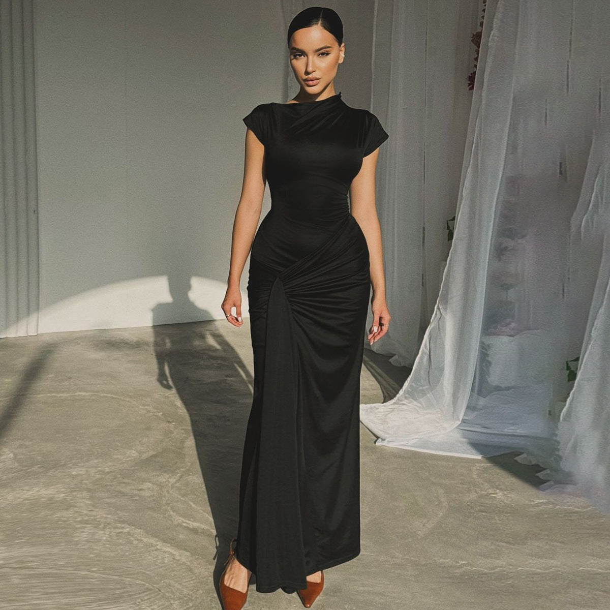 Elegante vestido largo ajustado de manga corta