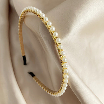 Diadema de perlas