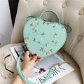 Bolso de corazones con encaje